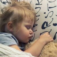Sweet dreams- toddler sleeping with teddy bear