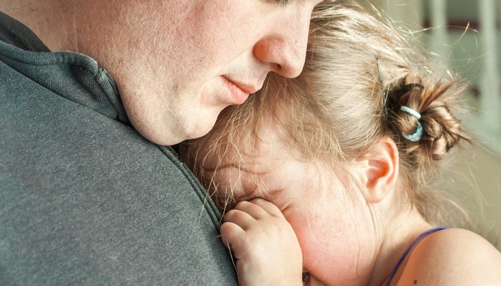 Sad,Father,Comforting,His,Crying,Preschool,Age,Daughter.,Great,Parenting