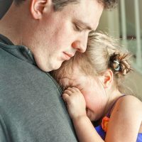 Sad,Father,Comforting,His,Crying,Preschool,Age,Daughter.,Great,Parenting