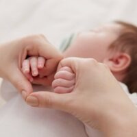 Bed,,Holding,Hands,And,Mother,With,Baby,,Love,And,Support