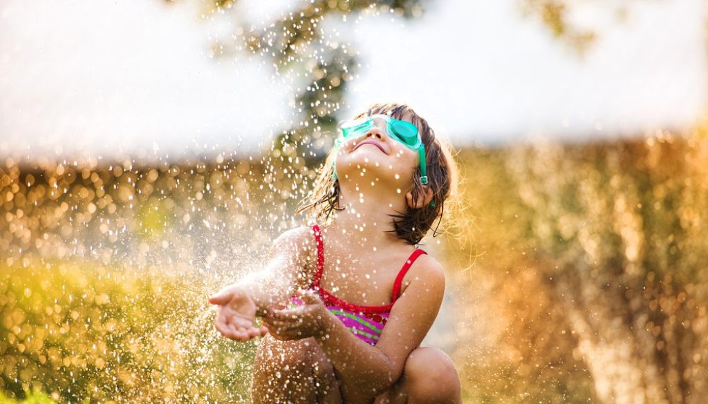 Cute,Little,Girl,Having,Fun,Outside,In,Summer,Garden