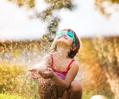 Cute,Little,Girl,Having,Fun,Outside,In,Summer,Garden